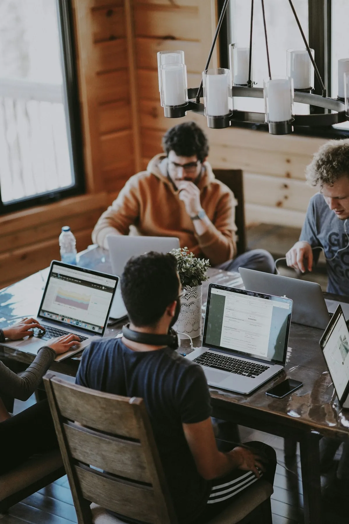 Colleagues collaborating around a table at work